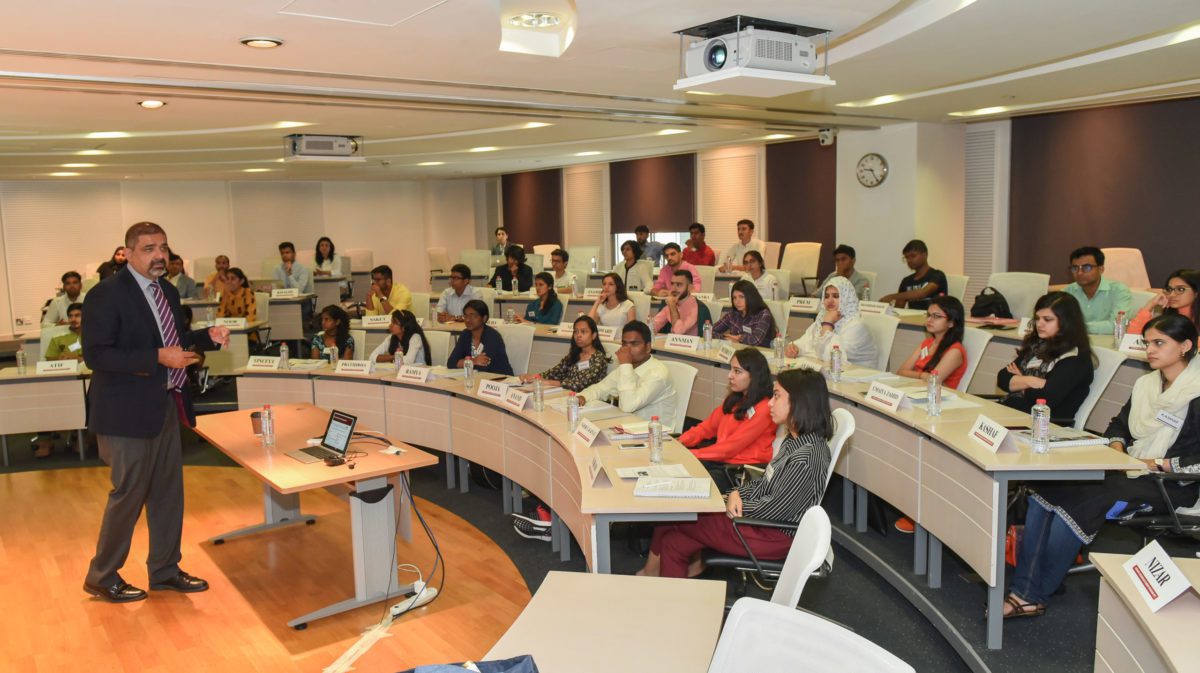 Professor Karim Lakhani (HBS) teaching a classroom of Crossroads students in Dubai.