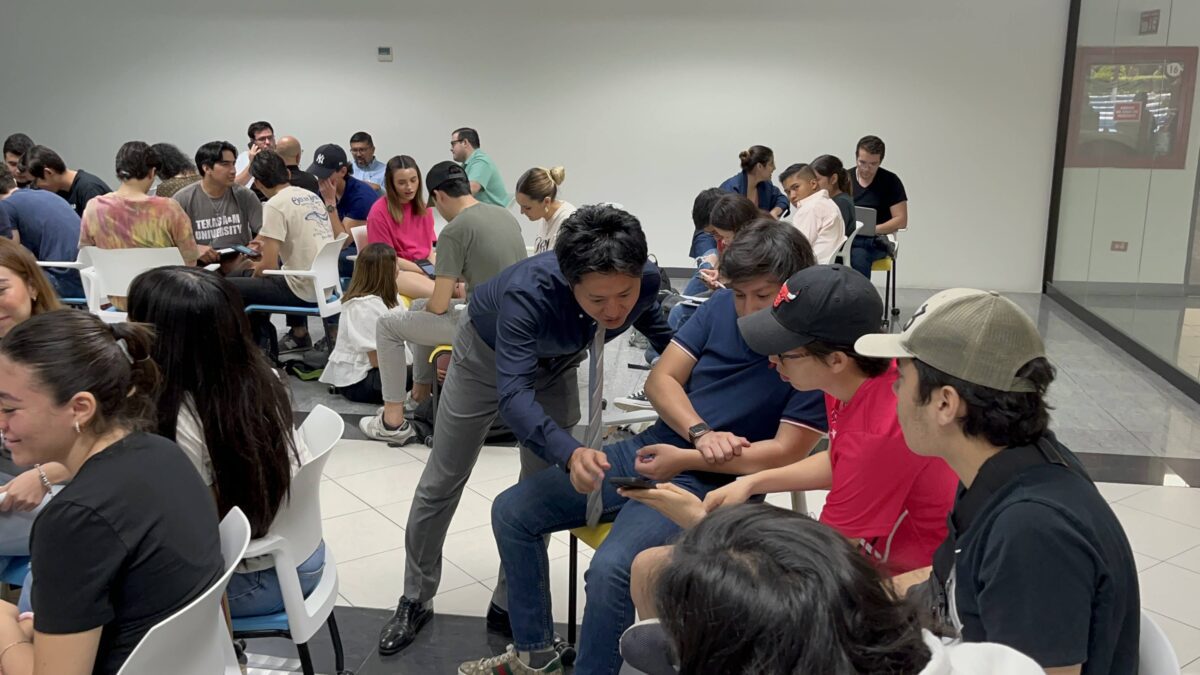 Takeo mentoring others in Mexico after a connection with Aspire Global Partner.